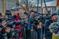 Press and media camera ,video photographer on duty in public new Royalty Free Stock Photo