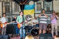Lviv, Ukraine - September 2015: Musicians play the trumpet, guitar, piano and drums at the Lviv CafÃÂ© before the audience fans