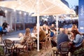 Lviv, Ukraine, September 15, 2018: people in open street cafe in old town Royalty Free Stock Photo