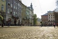 Lviv, Ukraine. September 02, 2014 Rynok Square near the Old Town. Tourists walk around the center of the city. Tramways Royalty Free Stock Photo