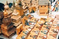 Lviv, Ukraine - September 7, 2022 : wooden church miniature and slavic icons as a souvenir at flea market