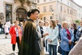 Lviv, Ukraine. Tour guide as a city manager on an animated tour in the historical part of the city and tourists