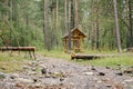 Lwooden gazebo standing deep in the forest Royalty Free Stock Photo