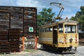 LX Factory. Old tram. Lisbon Portugal. Yellow. Clouds wonderful day sky background.