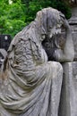 The Lychakiv cemetery in Lviv Ukraine. classic sculpture sad sorrowful woman at