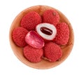 lychee fruit in wooden bowl isolated on white background. Top view. Flat lay Royalty Free Stock Photo