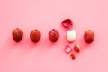 Lychee fruits pattern - with peeled one - on pink background flat lay top-down copy space Royalty Free Stock Photo