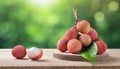 Lychee on wood with a blurred green background