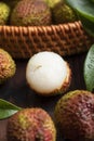 Lychees on a dark wooden table in the kitchen,Litchi chinensis Sonn,lizhi,close up