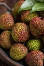 Lychees on a dark wooden table in the kitchen,Litchi chinensis Sonn,lizhi,close up