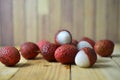 Lychees fruit on wooden background