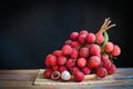 lychees on table and black background, fresh ripe lychee fruit tropical fruit peeled lychees slice in Thailand Royalty Free Stock Photo