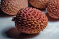 Lychees on a white background. Tropical fruit.