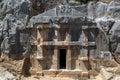 A Lycian rock-cut tomb at the ancient site of Myra at Demre in Turkey. Royalty Free Stock Photo