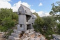 Lycian sarcophagus tombs in acient city Kyaneai Royalty Free Stock Photo