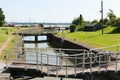 Lydney harbour lock gates Gloucestershire England uk with boats in summer