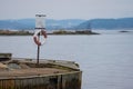 Lyfe bouy on a pier by the sea..