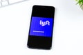Lyft Direct, powered by Payfare app logo on a smartphone screen. Royalty Free Stock Photo