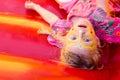 Lying child with facepainting Royalty Free Stock Photo