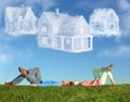 Lying couple on grass and dream three cloud houses