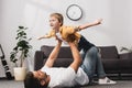 Lying in floor and holding adorabe Royalty Free Stock Photo