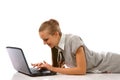 Lying girl with laptop (isolated)