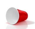 Lying horizontally red plastic cup. Royalty Free Stock Photo