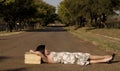 Lying in the road