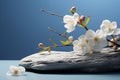 Lying stone and flowers on a serene light blue background