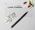 Lyme Disease diagnosis written on a white piece of paper