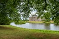 Lyme Hall and its pond inside Lyme Park in Cheshire, England.