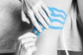 Lymphatic knee technique, two fan strips. Kinesiology Tape in si Royalty Free Stock Photo