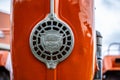 Front logo of a vintage orange Allgaier Porsche tractor..