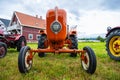 Front logo of a vintage orange Allgaier Porsche tractor..