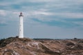 Lighthouse Lyngvig Fyr at danish west coast in spring. High quality photo