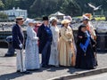 LYNMOUTH, DEVON, UK - MAY 13 2023: Queen Victoria and entourage group, part of Victorian and Steampunk Day.
