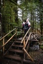 Young couple having fun in forest. Royalty Free Stock Photo