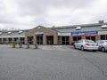 Lynnwood, WA USA - circa April 2022: View of a Now Hiring sign outside of the Mill Creek United States Postal Service building