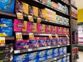 Lynnwood, WA USA - circa February 2023: Low angle view of feminine hygiene products for sale inside a grocery store