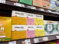 Lynnwood, WA USA - circa February 2023: Low angle view of feminine hygiene products for sale inside a grocery store