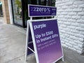 Lynnwood, WA USA - circa July 2023: Angled view of a sandwich board sign for Purple mattresses at the Alderwood Mall