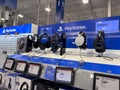 Lynnwood, WA USA - circa March 2023: Wide view of Playstation headsets for sale inside a Best Buy store Royalty Free Stock Photo