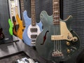 Lynnwood, WA USA - circa May 2022: View of various bass guitars for sale inside a Guitar Center musical instrument store