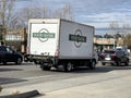 Lynnwood, WA USA - circa May 2023: Wide view of a food bank delivery truck sitting in traffic by the interstate