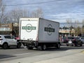 Lynnwood, WA USA - circa May 2023: Wide view of a food bank delivery truck sitting in traffic by the interstate