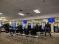 Lynnwood, WA USA - circa November 2022: Wide view of people inside the Lynnwood DMV building, updating and applying for licenses