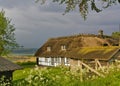 Lyo, Denmark - July 4th, 2012 - Traditional timber-framed thatched Danish farmhouse on the island of Lyo in the Baltic