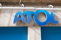 Atol Optic text logo and brand shop sign store french medic Optician glasses entrance wall