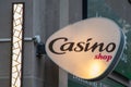 Casino shop city supermarket logo text and brand sign light signage facade market store of