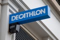 decathlon city sign text and brand logo entrance facade wall store building storefront signage